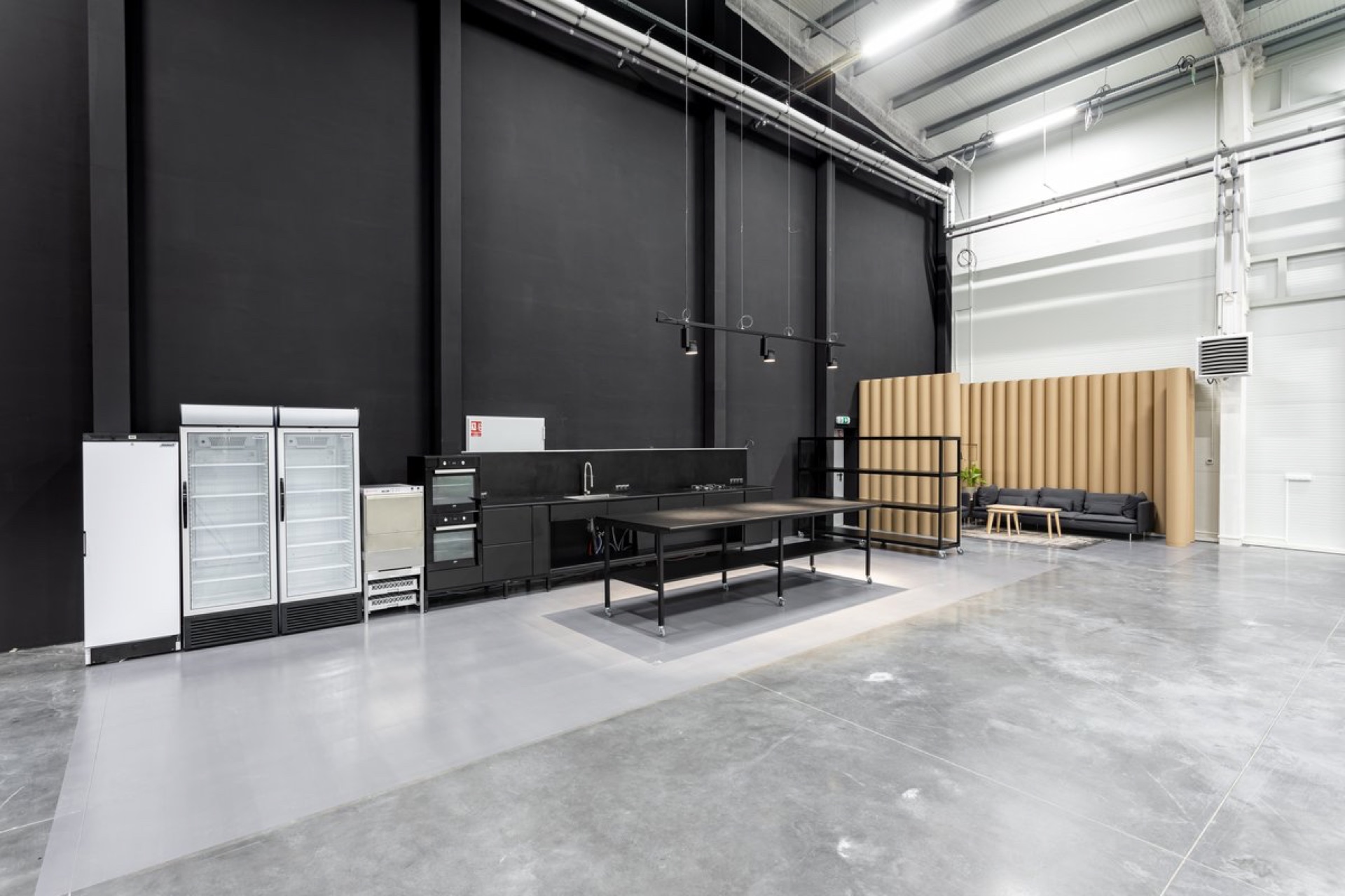 Bites Production Hub studio — black-walled pro kitchen set